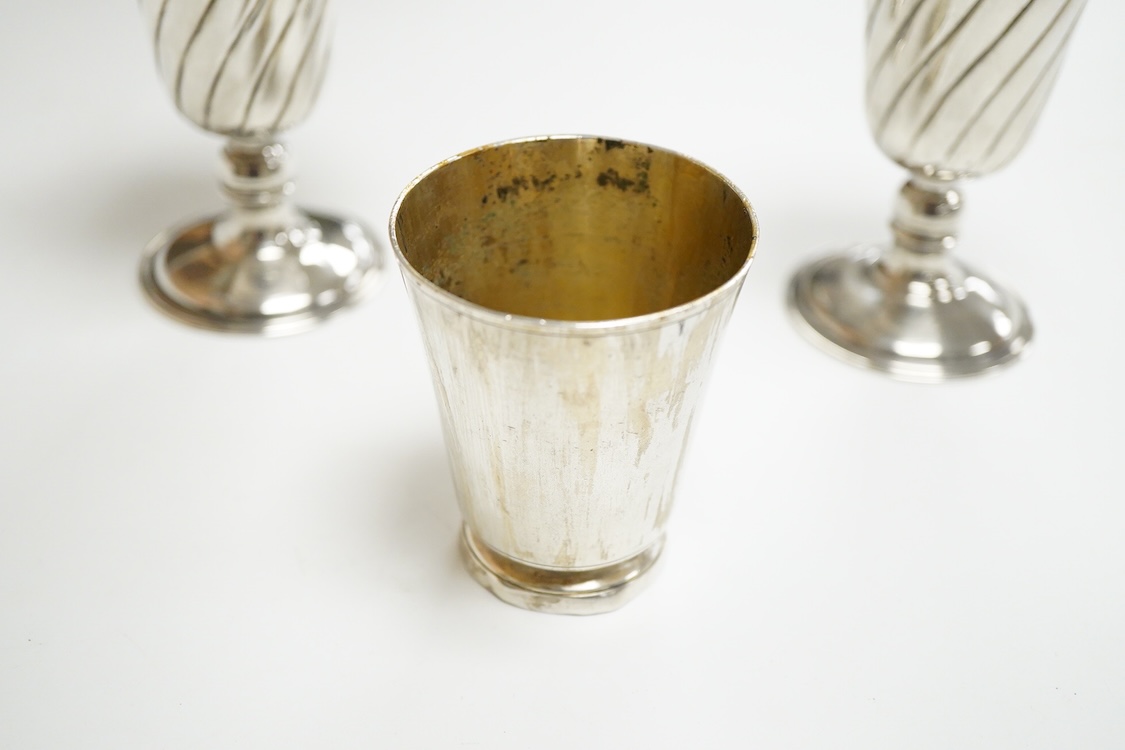 A pair of Turkish? 900 standard white metal goblets, 11.1cm, together with an 800 standard small beaker, 7oz.